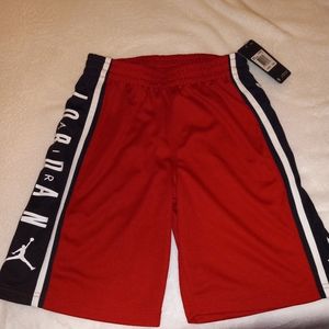 Boys Jordan Red and Black Shorts With White Accent.